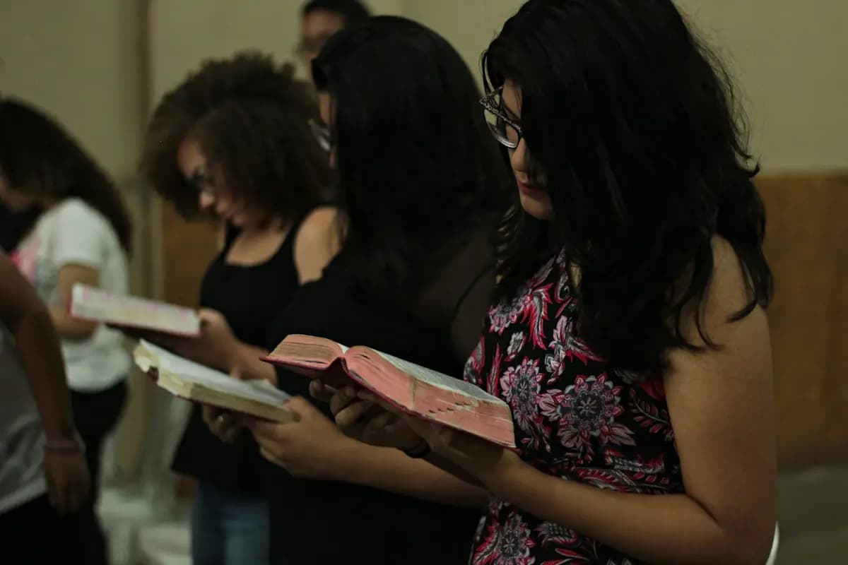 Church members reading their Bibles together